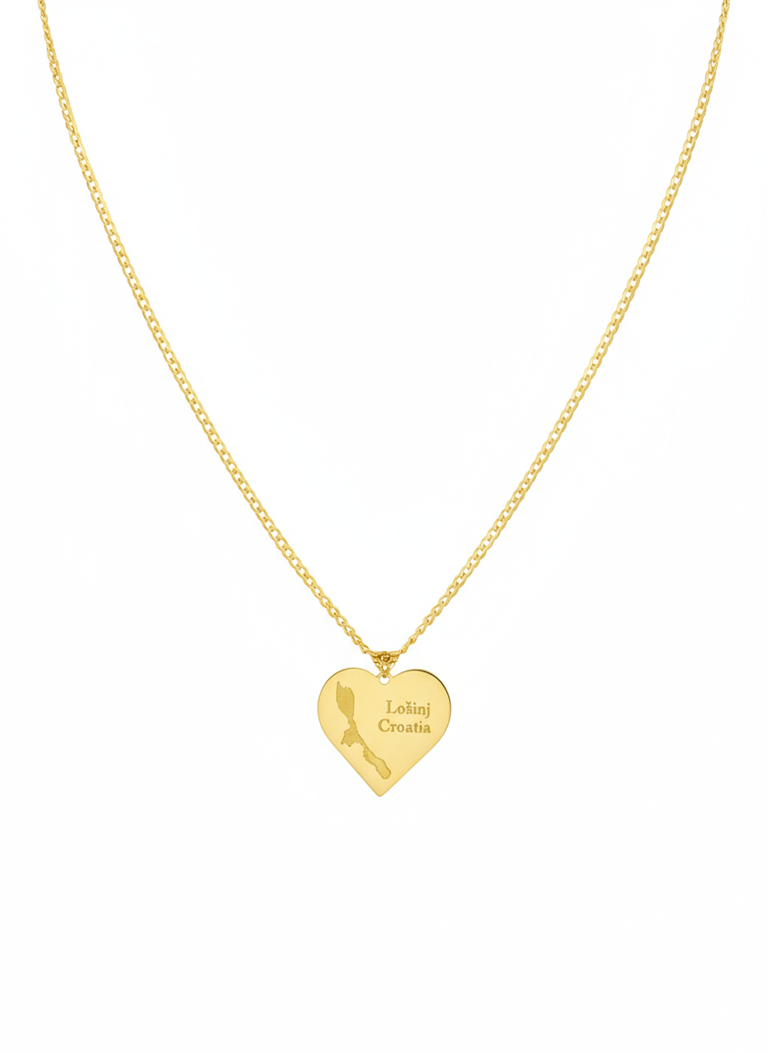 Gold necklace with heart pendant on white background