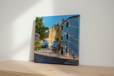 Small unframed on shelf